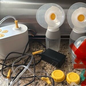 Medela Breast Pump Kit with Yellow and Clear Parts